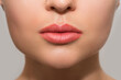 Female lips after permanent makeup lip blushing procedure