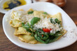 © ltyuan - Italian ravioli pasta with meat, spinach and cheese.