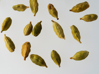 Wall Mural - Cardamom pods isolated on white background top view