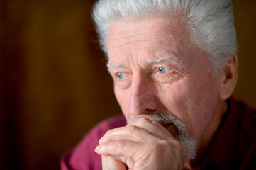 Sticker - Close up portrait of thoughtful senior man