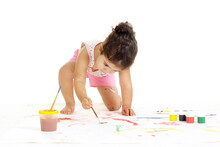 Portrait Of Young Girl Painting Picture On A White Background