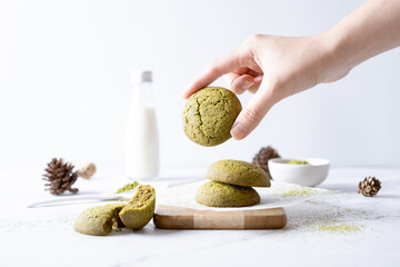 Matcha greentea cookies set on cafe table.