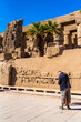 © alipko - EGYPT - KARNAK TEMPLE - Large sculptures of pharaohs inside beautiful Egyptian landmark with hieroglyphics, and ancient symbols. Famous landmark in the world near Nile River and Luxor, Egypt