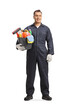 © Ljupco Smokovski - Full length portrait of a professional male cleaner in a uniform posing with a bucket of cleaning supplies