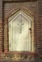 Vintage Church Door With Brick Wall