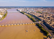 View From Drone Of Modern Cityscape Of French Port City Of Bordeaux On River Garonne In Summer
