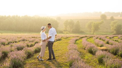 Wall Mural - Beautiful couple on the lavender field