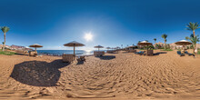 Full Seamless Spherical Hdr 360 Panorama View On Coast Of Sea With Wooden Beach Umbrellas And Sun Loungers By Red Sea In Bright Sunny Day In Equirectangular Projection, Ready For VR AR Virtual Reality