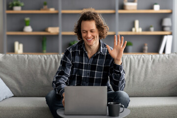 Poster - Happy Guy Waving Hand To Laptop Video Calling At Home