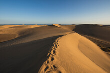 Footprints On Sand Dunes Under Blue Sky, Grand Canary, Canary Islands, Spain