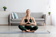 © Prostock-studio - Health practice concept. Woman sitting in lotus pose and meditating with eyes closed alone
