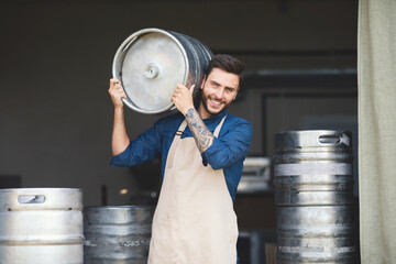 Wall Mural - Strong warehouse worker, brewery owner working at plant, small business and success emotions