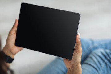 Poster - Black woman holding digital tablet with blank screen mockup for application, website or advertisement, empty space