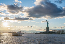 Liberty Island With Statue Of Liberty At Sunset, New York City, USA
