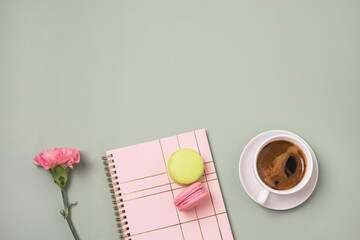 Wall Mural - Delicious Colorful Macarons with Cup of Coffee Coffee Break Scene with Macaron Candy Flower and Notebook Copy Space Workspace Blogger