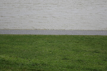 High tide at the dike (dyke) of River Weser, Bremerhaven, Bremen, Germany