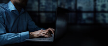 Businessman Working On Laptop In Dark Office At Night. Banner Copy Space