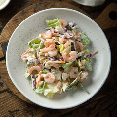 Wall Mural - Green salad with shrimps and mayo dressing