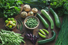 Assortment Of Organic Home-grown Vegetables From Own Garden. Plenty Fresh Veg Of Various Colors, Species And Cultivar.