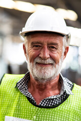 Wall Mural - Portrait of senior engineering architect builder wearing protective hardhat working at Metal lathe industrial manufacturing factory. Engineer Operating  lathe Machinery. Elderly people