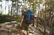© Svitlana - Happy middle aged caucasian man with tourist backpack