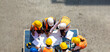 © NVB Stocker - Ethnic diversity worker people, Success teamwork. Group of professional engineering people wearing hardhat safety helmet meeting with solar photovoltaic panels discussion in new project