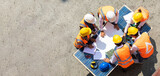 Fototapeta  - Ethnic diversity worker people, Success teamwork. Group of professional engineering people wearing hardhat safety helmet meeting with solar photovoltaic panels discussion in new project