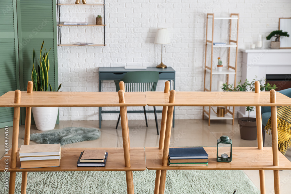 Stylish interior of room with bookshelf