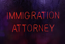 Vintage Immigration Attorney Sign In Rainy Window