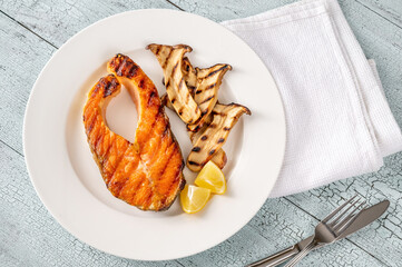 Wall Mural - Grilled salmon steak with mushrooms