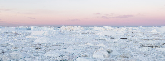 Wall Mural - climate change and global warming. icebergs from melting glacier in ilulissat, greenland. arctic nat