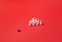 Bowling Ball And Pins On Red Background