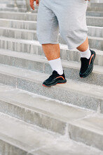 Photo Of Male Feet Descending Stairs