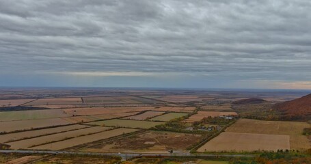 Wall Mural - Farmland meadow small village country at aerial panorama view on agricultural fields being