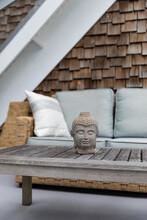 Coffee Table Couch At Home With Buddha Head 