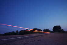 Night Road Trip: Car Light Trails In Country Nature