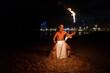 © Igor Kardasov/Stocksy - Latin male with naked torso doing fireshow