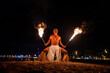 © Igor Kardasov/Stocksy - Latin fireshow performer doing hoko dance