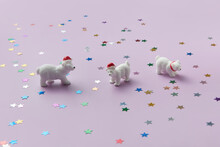 Figures Of White Bears Among Confetti