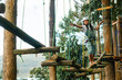 © Kike Arnaiz/Stocksy - Arab woman on rope course