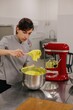 © Liliya Rodnikova/Stocksy - Woman cooking macarons