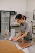 © Liliya Rodnikova/Stocksy - Woman prepare pastry bag with cream
