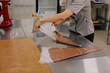 © Liliya Rodnikova/Stocksy - Anonymous baker prepare pastry bag with chocolate cream