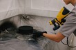 © Liliya Rodnikova/Stocksy - Cook spraying cake from airbrush