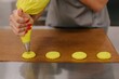 © Liliya Rodnikova/Stocksy - Anonymous woman cooking macarons