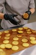 © Liliya Rodnikova/Stocksy - Baker makes macaroons