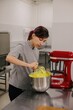 © Liliya Rodnikova/Stocksy - Woman chef at professional kitchen