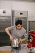 © Liliya Rodnikova/Stocksy - Woman mixing dough