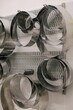 © Liliya Rodnikova/Stocksy - Metal cake forms on shelf