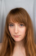 © Hernandez & Sorokina/Stocksy - Red Hair Woman Portrait Looking To The Camera